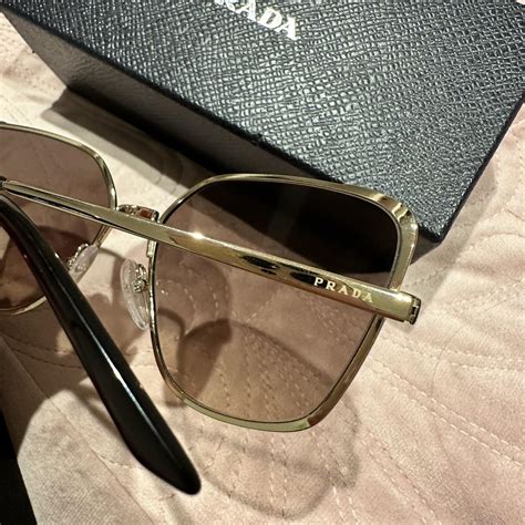 black and gold prada sunglasses